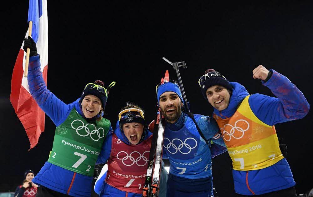 L’Equipe de France menée par Anaïs Bescond, Marie Dorin-Habert, l’inévitable Martin Fourcade et Simon Desthieux, a remporté ce mardi la médaille d’or du relais mixte en biathlon ©AFP