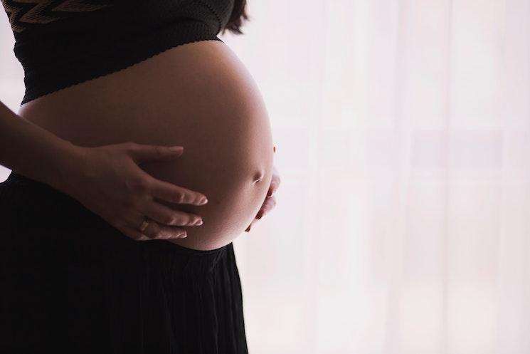 Photographie d'une femme enceinte