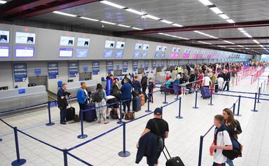 Voyageurs dans l'aéroport de Sydney