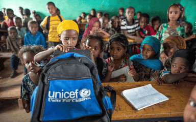 Des élèves assistent à un cours à l'école primaire Tutis, dans l'État d'Oromia, en Éthiopie. Crédit : UNICEF Éthiopie, 2013. CC BY-NC-ND 2.0.