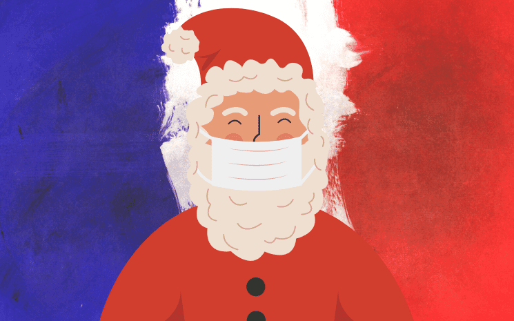 Le Père Noël masqué devant un drapeau français