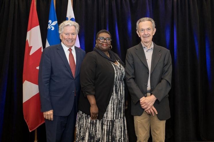 Ericka Alneus entouré de Christian Philip et Michel Robitaille les co-fondateurs du RIMF