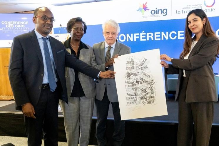 Claude Musavyi, Louise Mushikiwabo et Jean‑Gérard Bosio