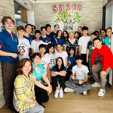 IFS students accompanied by their teachers: Mr Gan, in red and Mrs Guffroy, in yellow.