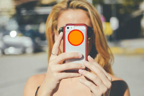 iPhone-6-camera-features-woman-taking-photo-for-featured-image