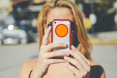 iPhone-6-camera-features-woman-taking-photo-for-featured-image