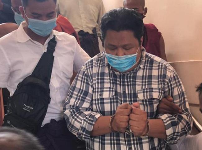 Kyaw Win Thant, menottes aux poignées en Birmanie