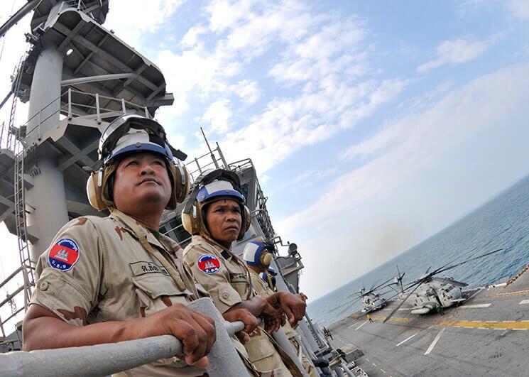 US_Navy_110227-N-9950J-210_Royal_Cambodian_Navy_officers_observe_flight_quarters_during_a_ship_tour_aboard_the_forward-deployed_amphibious_assault