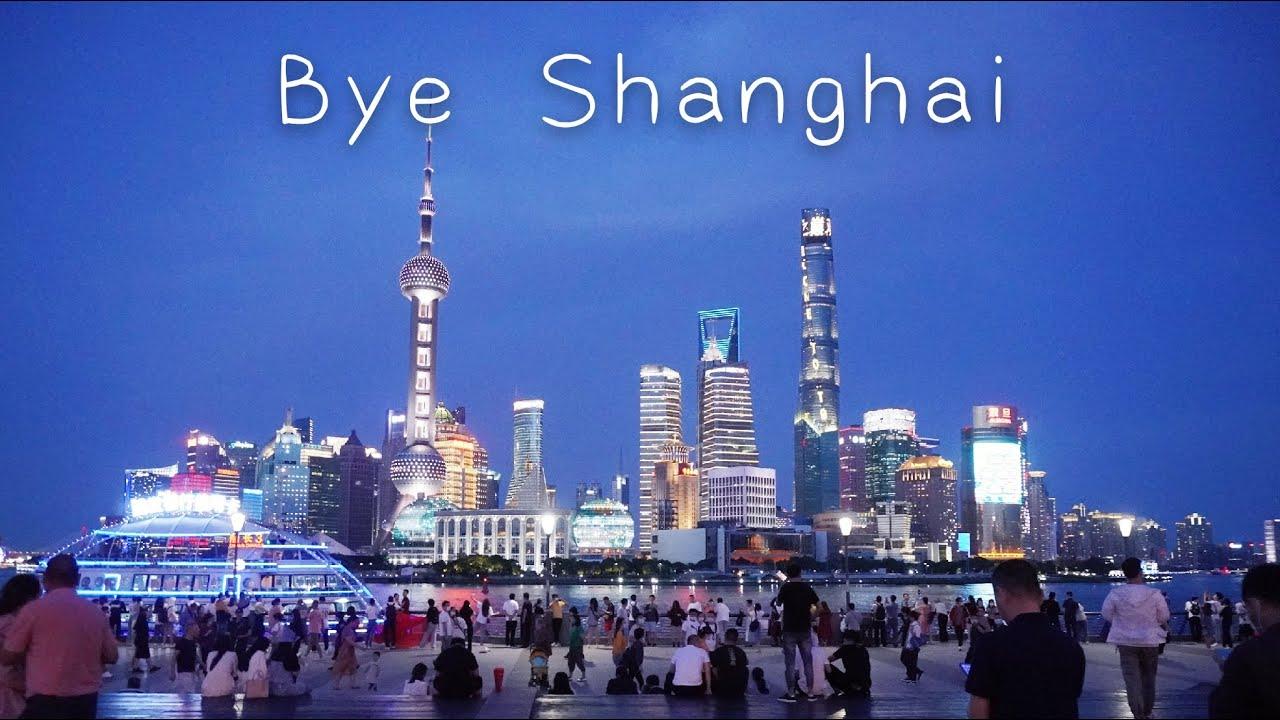 Une photo de Shanghai avec l'inscription "Bye Shanghai" écrite dessus