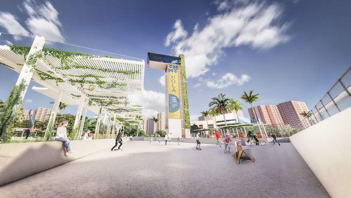 une tour avec un jardin vertical et des panneaux solaires à Valencia