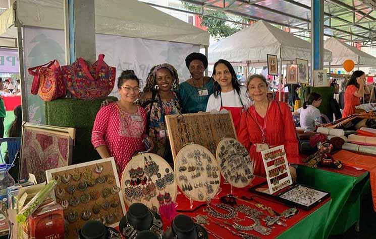 woman international group Christmas fair