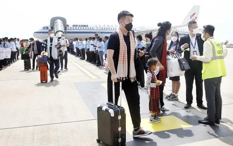 Des touristes chinois arrivant à aéroport international de Phnom Penh - Phearum:Xinhua
