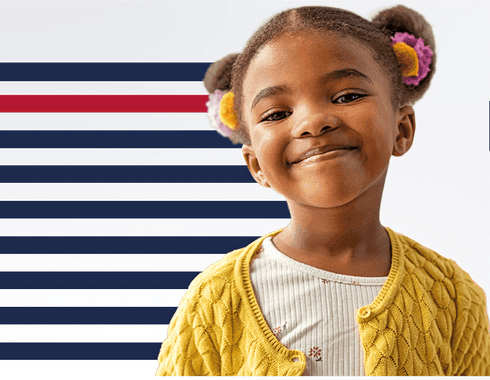 une petite fille métisse élève à la maternelle du lycée français de madrid