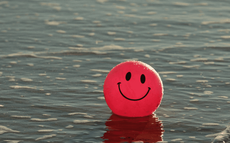 smiley joie rouge océan