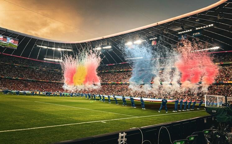 Supporters dans un stade de foot.