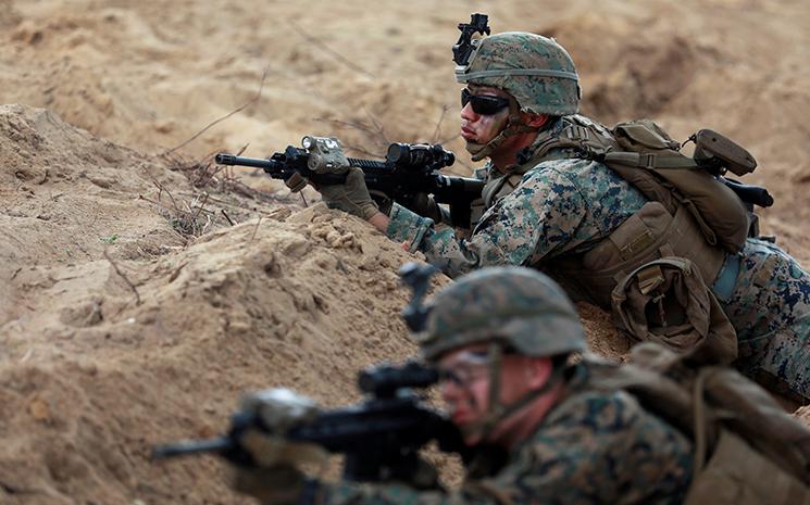 Des soldats en action lors des manoeuvres militaires Cobra Gold en Thailande