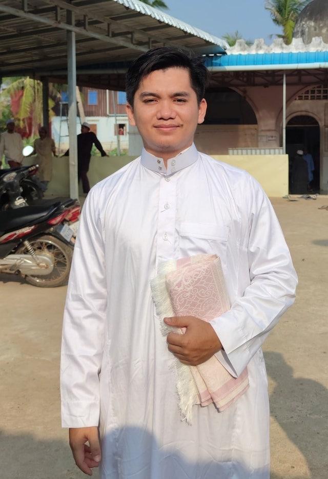 Him Imrorn, 24, a Muslim from Pursat province, wearing traditional Muslim attire. Photo provided_