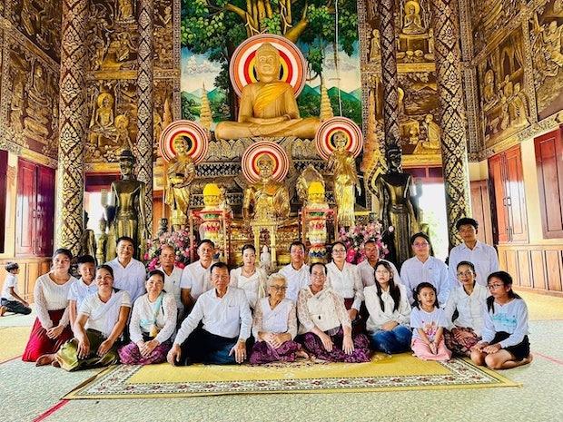Kosal Sereykanya, 21, from Phnom Penh, goes to the pagoda with her relatives during the Pchum Ben Festival. Photo provided_1737446928.jpg (270.56 Ko)