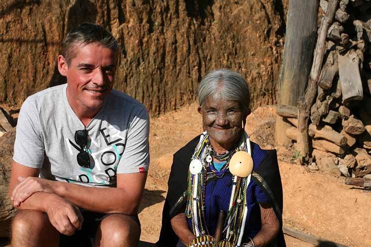 Photograph of Christian Develter with the Chin Tribe