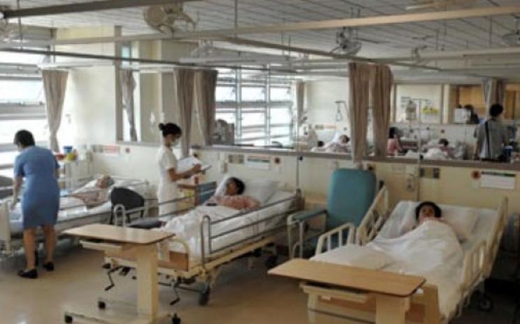 Une chambre commune de classe C dans un hôpital public.