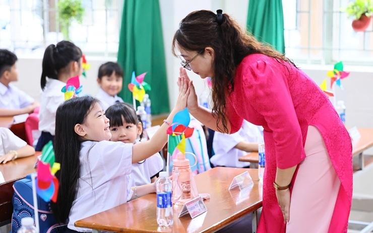 Les élèves d'école primaire Nguyen An Ninh