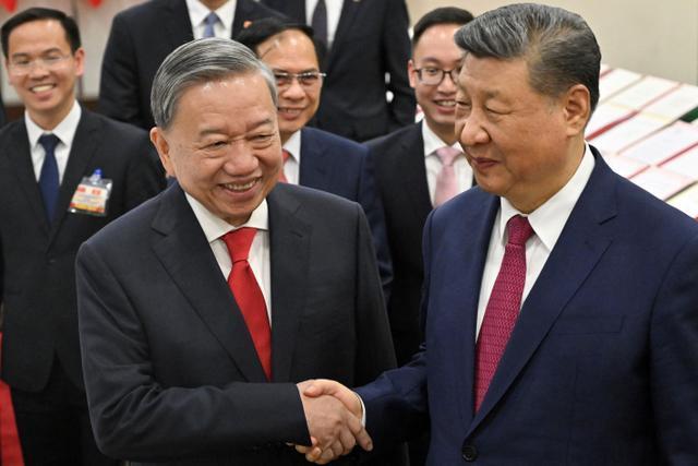 To Lam et président chinois Xi Jiping le 14 avril