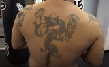 tatouage d'un ancien membre de triade à Hong Kong