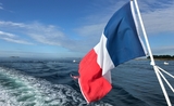 Drapeau français à la poupe d'un bateau