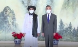 chef Taliban et le ministre chinois Weng Yi