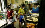 Une cuisine de restaurant en Thailande durant la pandemie de coronavirus