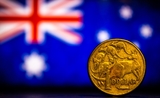 une pièce de monnaie devant le drapeau australien 