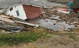 Des maisons son ravagées au Canada après le passage d'une tempête Fiona 