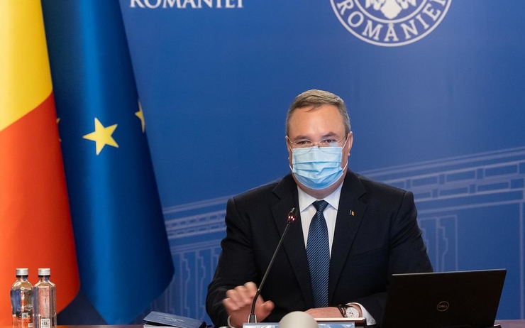 Le premier ministre roumain Nicolae Ciuca en train de s'exprimer