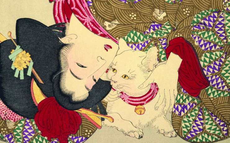 Une oeuvre exposée à la maison de la culture du Japon à Paris montrant une femme et un chat pour l'exposition bestiaire japonais