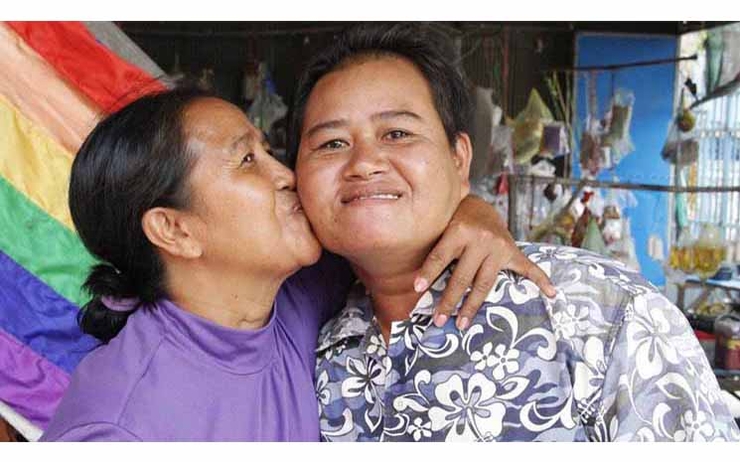 UN Women-Mariken Sao Mimol kisses her partner in Cambodia during an LGBT Pride event